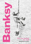 Banksy: The Man Behind the Wall: Revised and Illustrated Edition - Hardcover